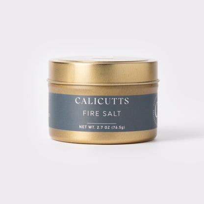 a gold container with a lid